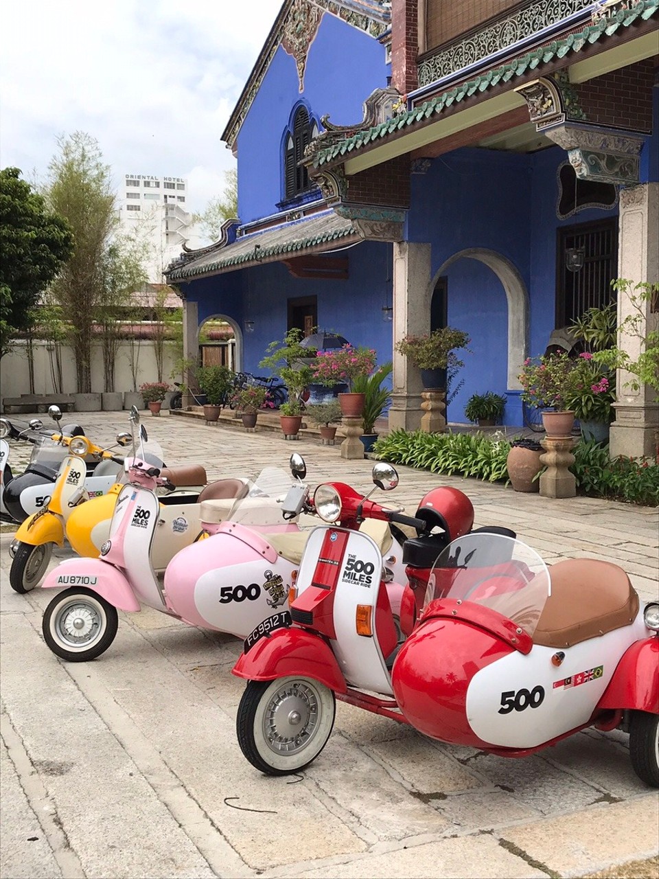 Malaysia - Georgetown - A rally of mopeds and sidecars from Nepal