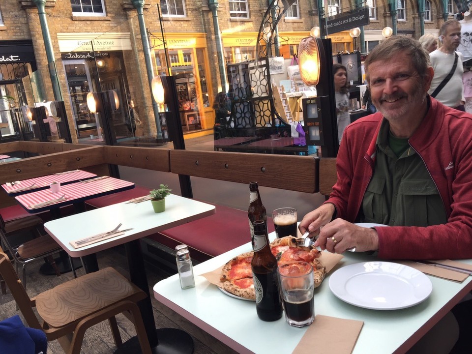  - United Kingdom, London, River Thames - Covent Garden. Eating pizza and drinking Guinness at Boho restaurant. 