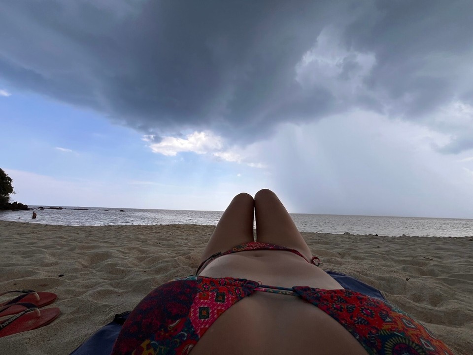 Thailand - Ko Lanta - Big black cloud in the sky but still on for the beach and into the sea until it absolutely started pissing it down 