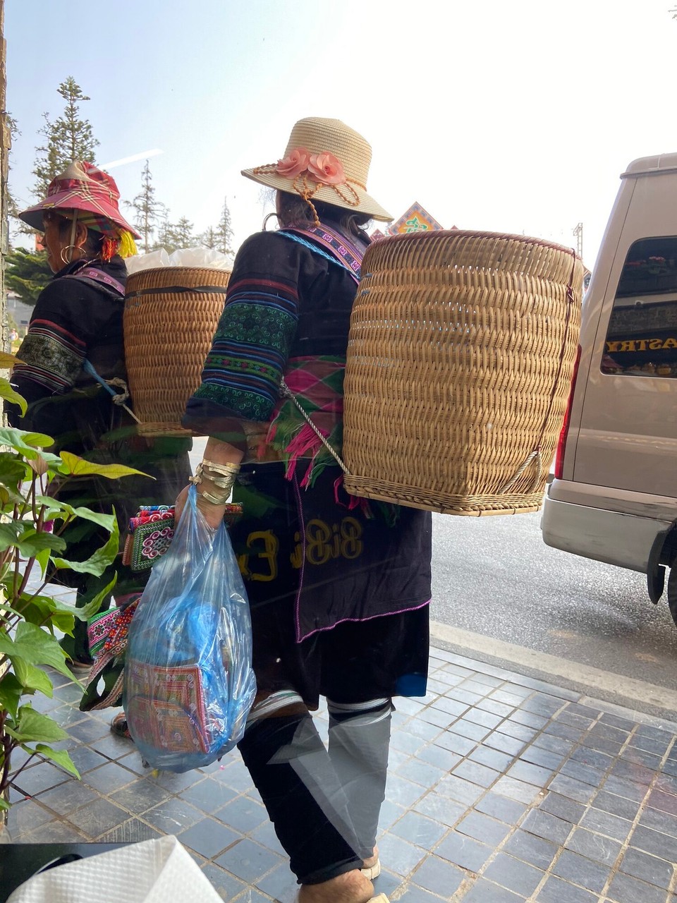 Vietnam - Sa Pa - While we were having our breakfast at BB cafe, some local ladies approached to sell the handmade goods. We don’t really need it but this is how they earn. I think we should buy some stuff. (They are not cheap but more expensive at souvenir shops.) 