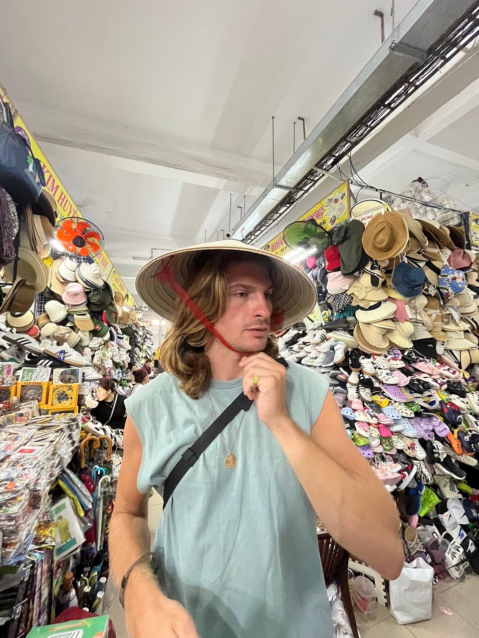 Vietnam - Da Nang - After driving around the city, we went to do some shopping at the market. Got a new jumper for when it gets a bit chilly over the night and in the north. We kept finding the stall people hidden in the clothes - what’s she doing in there 😂