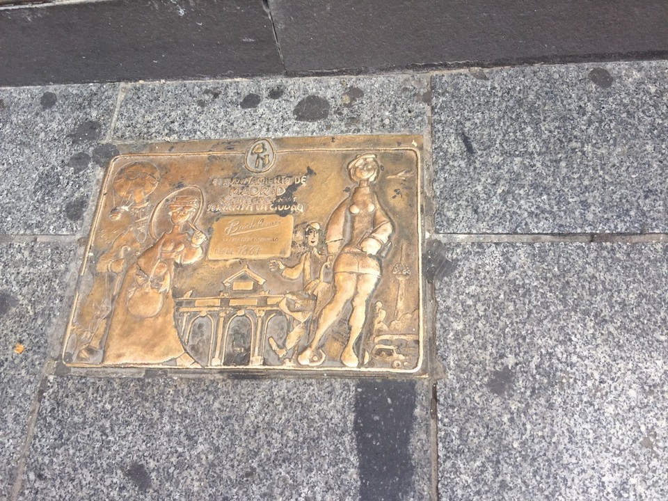 Spain - Madrid - Fundada antes de 1837 is an example of a store honoured with a city plaque in the pavement outside the store. The plaque represents the shop has been open and retailing for more than 100 years.