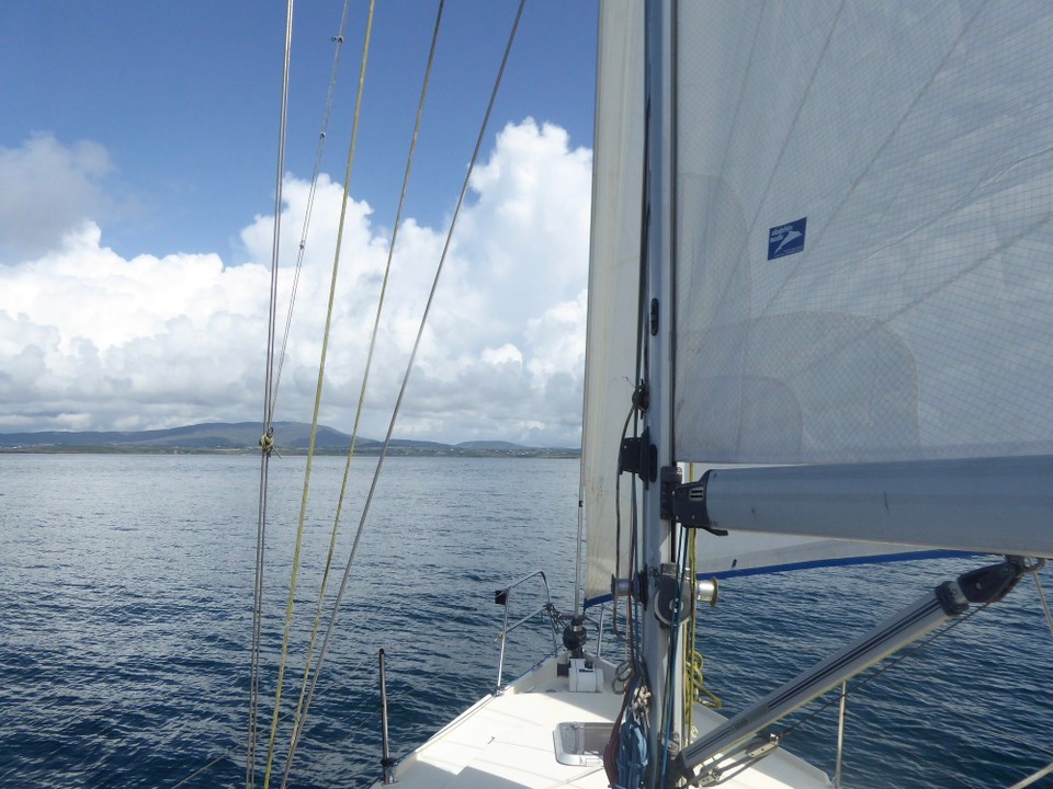 Ireland -  - As we rounded Toorane Rocks we hoisted the sails.