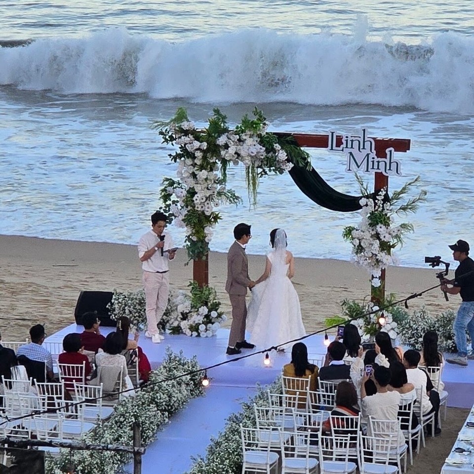 Vietnam - Song Cau - Vietnamese wedding on the beach (sad there’s so many empty chairs!) I felt like ‘wedding crashing’