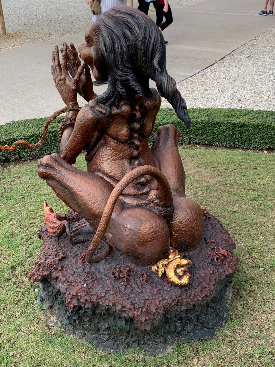Thailand - Chiang Rai - Golden poo on the statue outside the ladies toilet at the White Temple. WetRong Khun. The men’s statue had a lot more golden poo.