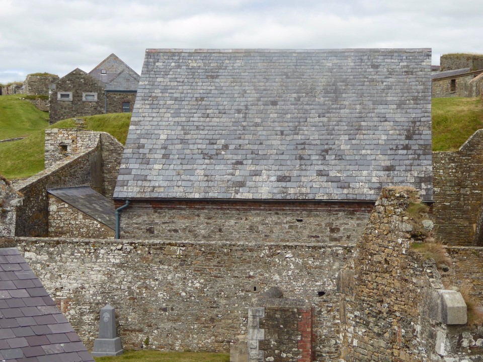 Ireland - Kinsale - The ammunition store was built without any metal nails and with a copper door and locks, which would absorb sparks. Before entering the store, men would change from wool clothing, which can create static electricity, to linen and swap their hobnail boots for wooden clogs (in the small separate hut).