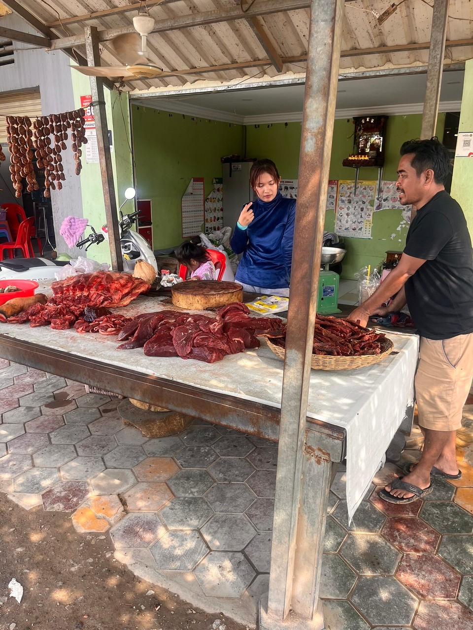 Cambodia - Phnom Penh - Van took us to his community’s local market and he knew everyone and got all our ingredients from here. Saw a lady hit a fish on the floor which was an experience and also one fish hopped out the bowl and she threw it straight back in… 