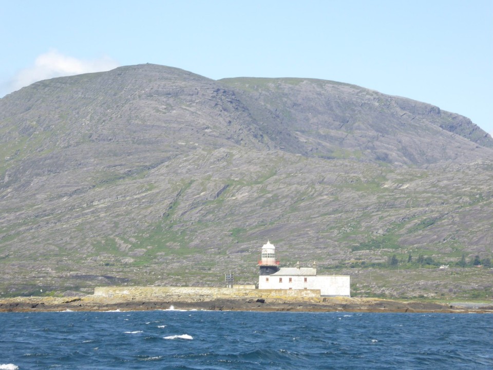 Ireland -  - Good to be passing the old lighthouse at the East Entrance of Bear Haven. Roancarrigmore is on an uninhabited island. After 165 years, the light was replaced by a stainless steel tower with solar powered LED lights.