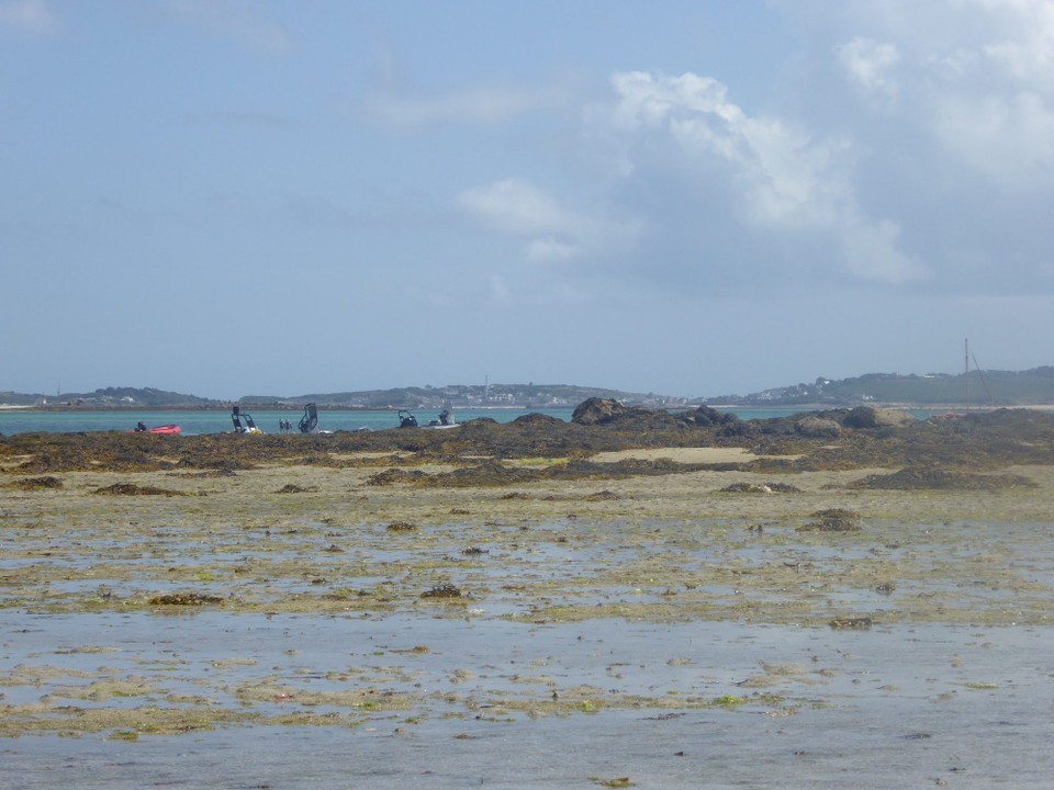 United Kingdom - Isles Of Scilly - Three Brothers at low tide.