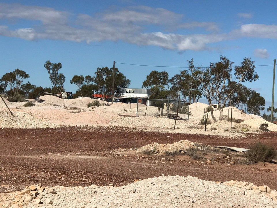 Australia - Lightning Ridge - Typical shanty surrounded by mullock!