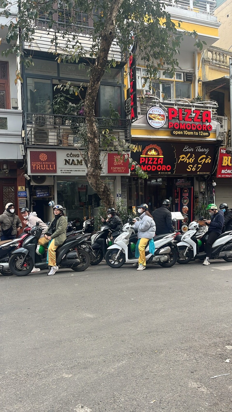 Vietnam - Hanoi - So busy here - bikes just drive every where with no stopping for pedestrians 