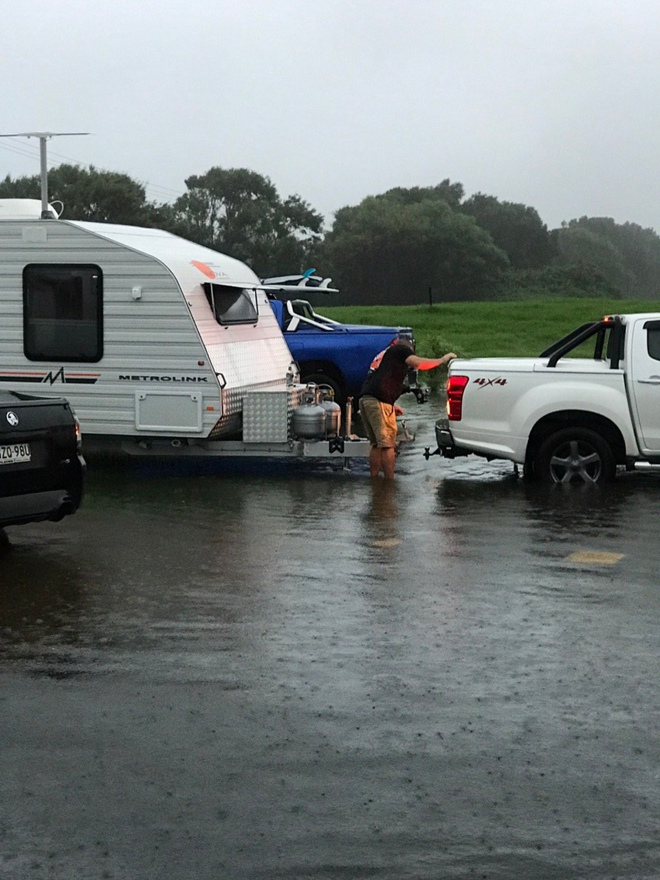 Australia - Barrack Point - Now we are being rescued!! A resident kindly hooked up our van and moved it .. car still stuck there tho !