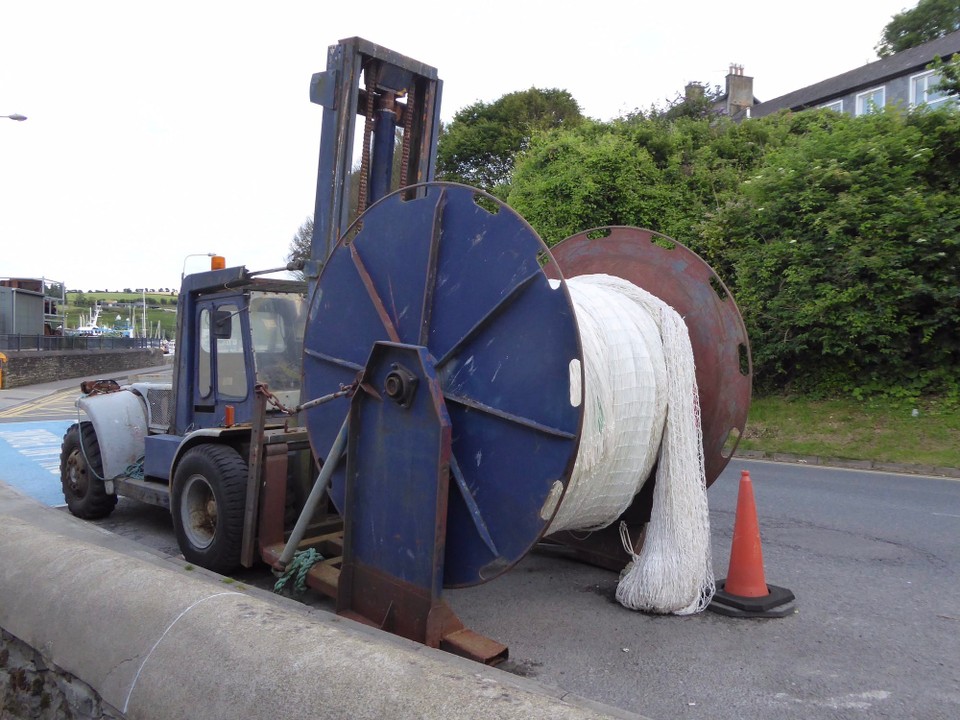 Ireland - Kinsale - Another delicious meal in Bruno’s.  Perfect for me as every course featured lashings of cheese.  Walking home we passed this reel of fishing nets, and nearby there is a shed for ‘retired nets’.