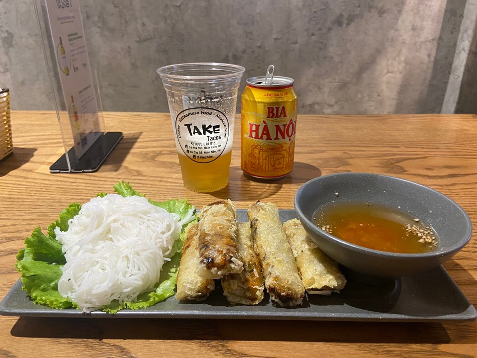 Vietnam - Hanoi - Here we go! 
Vegetable spring roll and Hanoi beer! 
Best combination for first dinner in Vietnam. 
Love it! 
All costed 133,000 VDN (26 RM) including tax. 