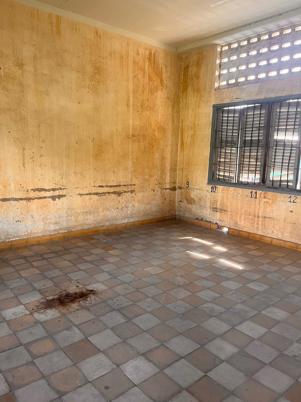 Cambodia - Phnom Penh - Jacob and I headed to the S21 Prison and Killing Fields. The prison was eery and still had blood on the floor as the cells were preserved from the war 