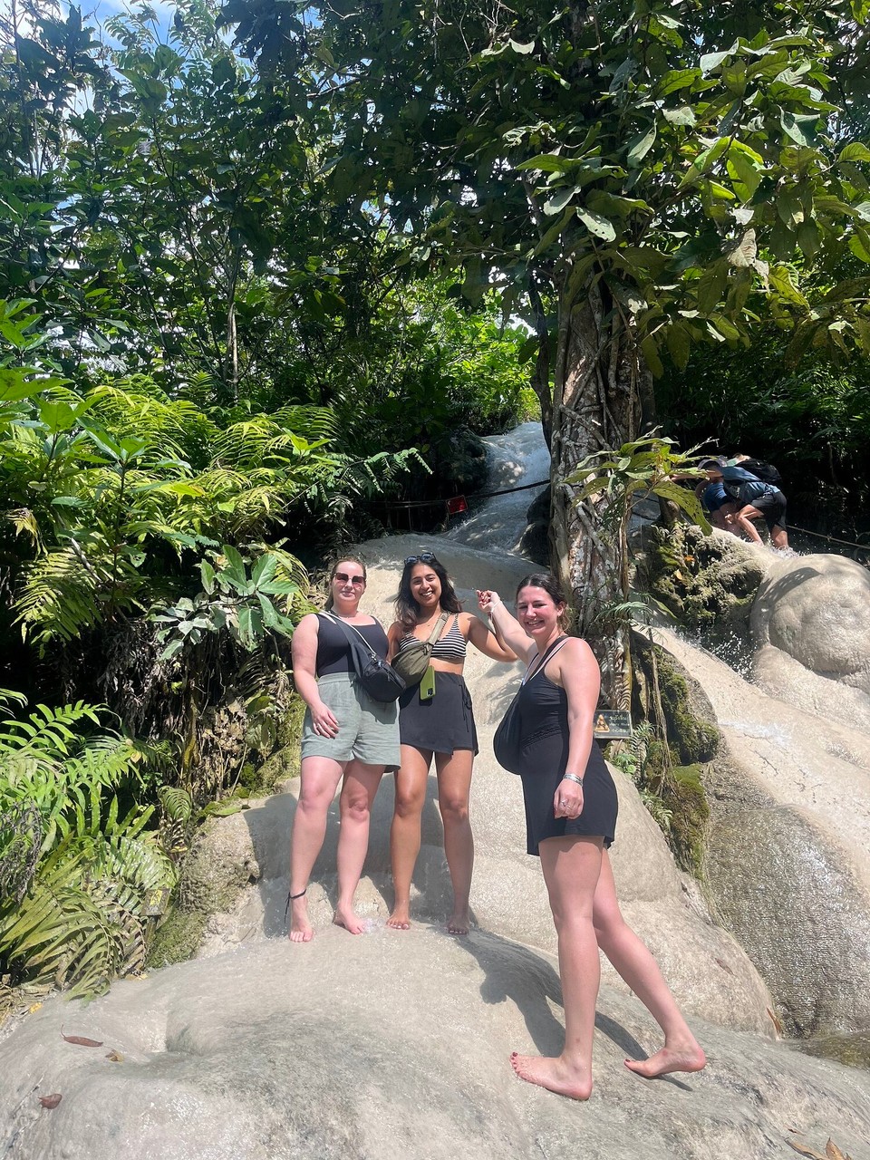 Thailand - Mueang Chiang Mai - It was a workout to do the waterfall climb and you have to be careful not to slip. It felt so good once we got to the top and the view was so nice. We took some cute pics on the swings and then headed back to the hostel. Ellie, Esha and I went for lunch and I had koh soi and a cucumber salad
