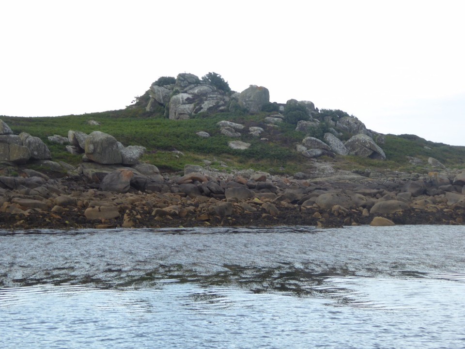 United Kingdom - Isles Of Scilly - Seabirds fly above this rock and constantly call out. The oyster catchers are particularly vocal, especially when another bird or human dare to venture nearby.