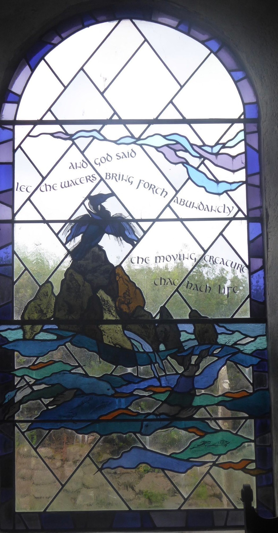 United Kingdom - Isles Of Scilly - Stained glass made by Oriel Hicks from the Pheonix Studio was inserted in 2007. 
Genesis 1:20. And God said, “Let the waters bring forth abundantly the moving creatures that have life…