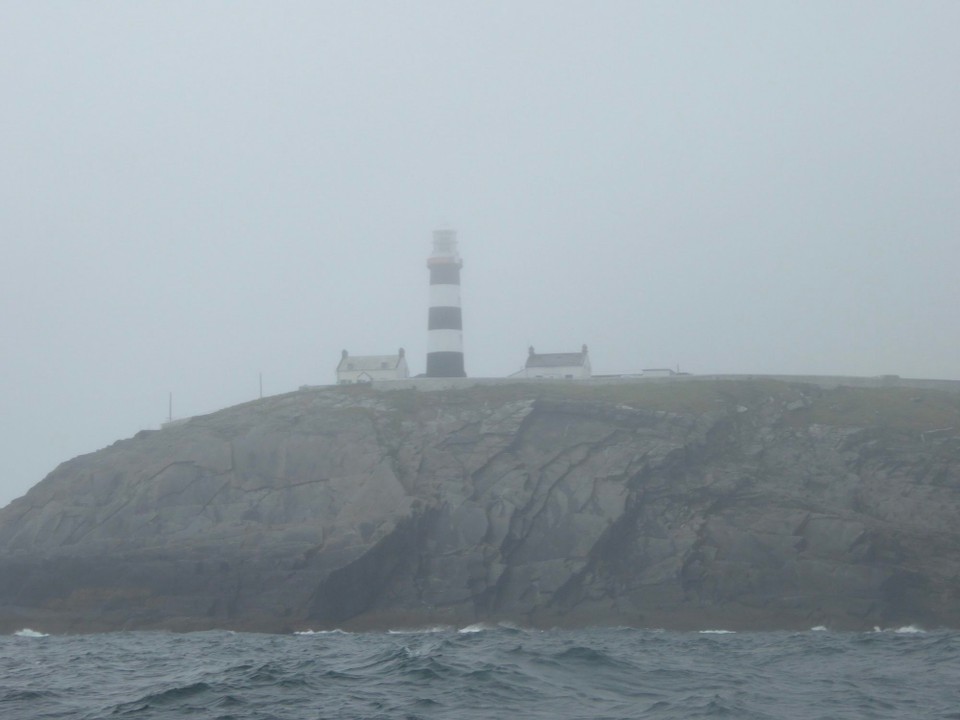 Ireland - Union Hall - Soaked through with water coming over the port side of Avalon, we steered away from Kinsale Head, avoiding the yacht, and ploughed out further to sea, with waves now breaking over our bow.