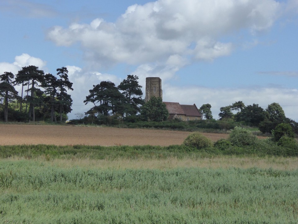 United Kingdom - Woodbridge - Sitting on a hill overlooking the river, Ramsholt All Saints is one of only 38 round tower churches in Suffolk, and 181 in England. Used as a watchtower by the Saxons against Viking invaders, by 1287 it was a charted seamark.  Much of the Norman church remains, but the windows are medieval.