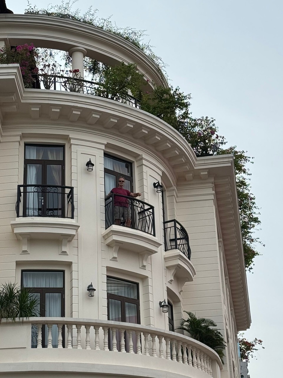 Vietnam - Can Tho - James surveying MK from our hotel balcony 