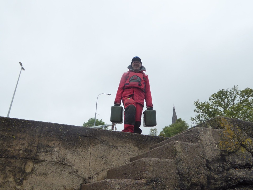 Ireland - Bantry - Midsummer’s Day, but it doesn’t feel like it. You wouldn’t want to be out west today Nora! We donned our waterproofs to take the dinghy to the jetty to fill water containers. 