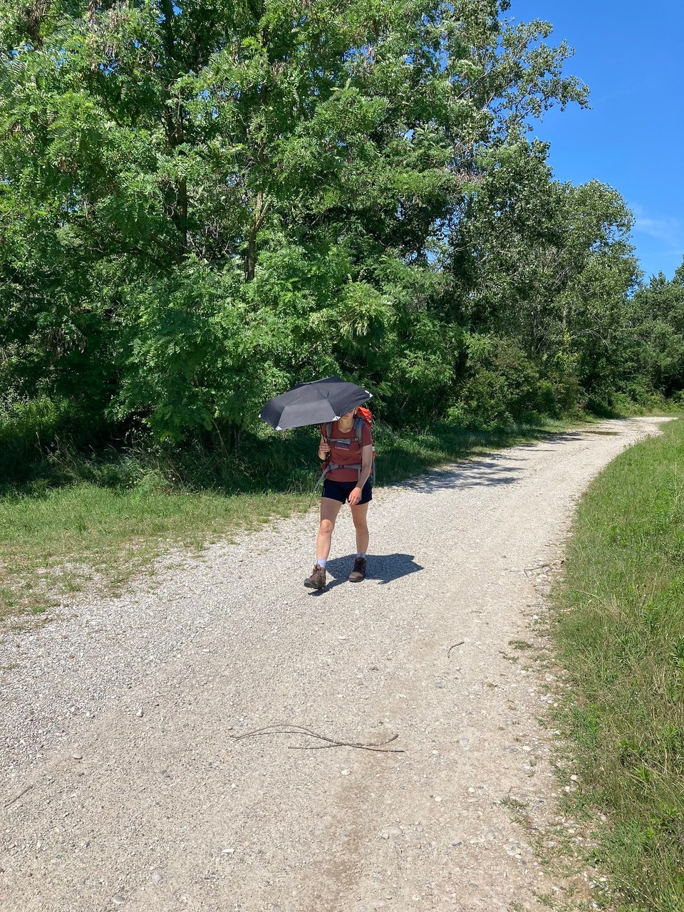 Italien - Breda di Piave - Mit Regenschirm als Sonnenschutz 