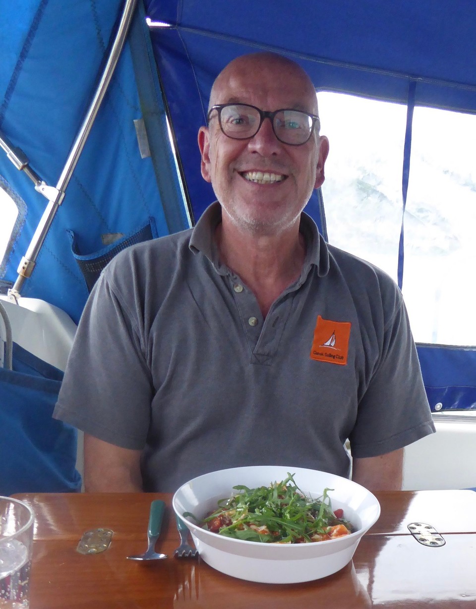 Ireland - Union Hall - Kevin is proud and amazed our cockpit tent has survived another year. This evening it provided just enough protection from a little rain and cool breeze.