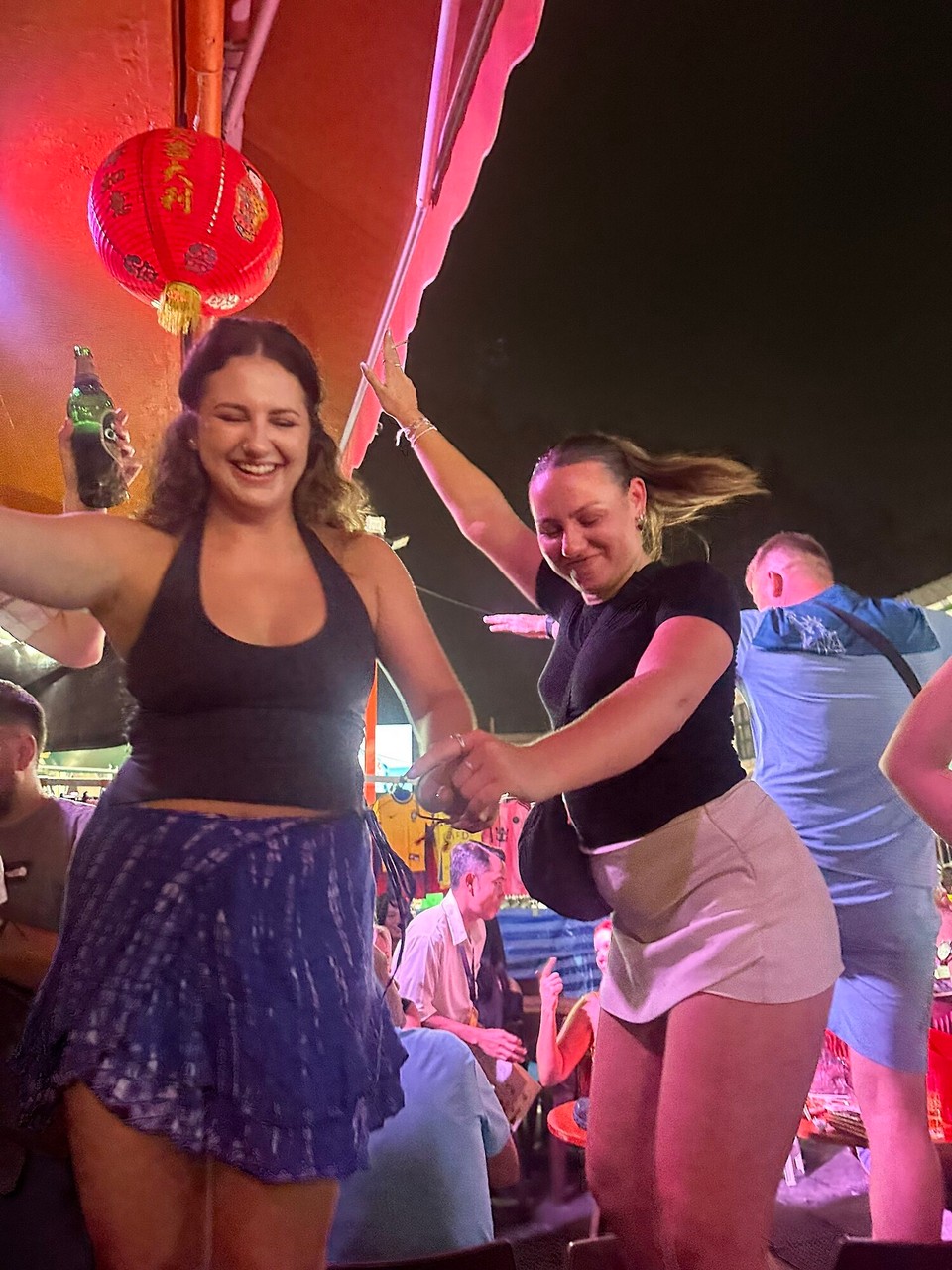 Thailand - Bangkok - Dancing the night away on the chairs as per usual 