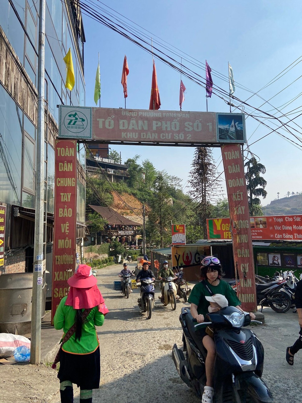 Vietnam - Sa Pa - First day in Sa Pa, we went Ma Tra and Ta Phin Village half-day trekking tour. My expectation of a trekking tour is in the forest on the ground. 
But it’s more like a village walk on concrete road. As a Burmese, I didn’t enjoy it. But you can rent a motor bike to finish the tour quick. 