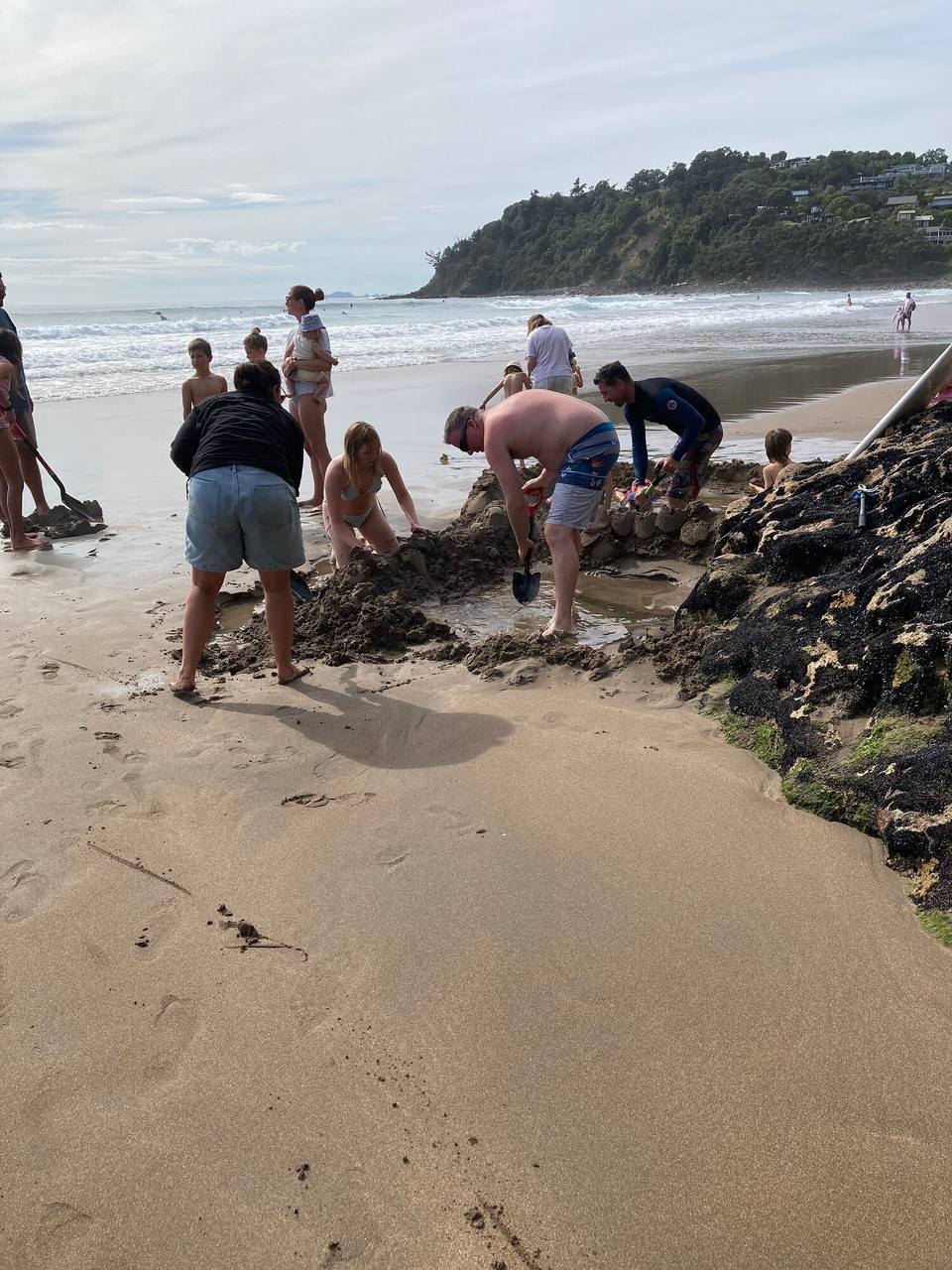 Neuseeland -  - … Buddelnde Menschen in die andere