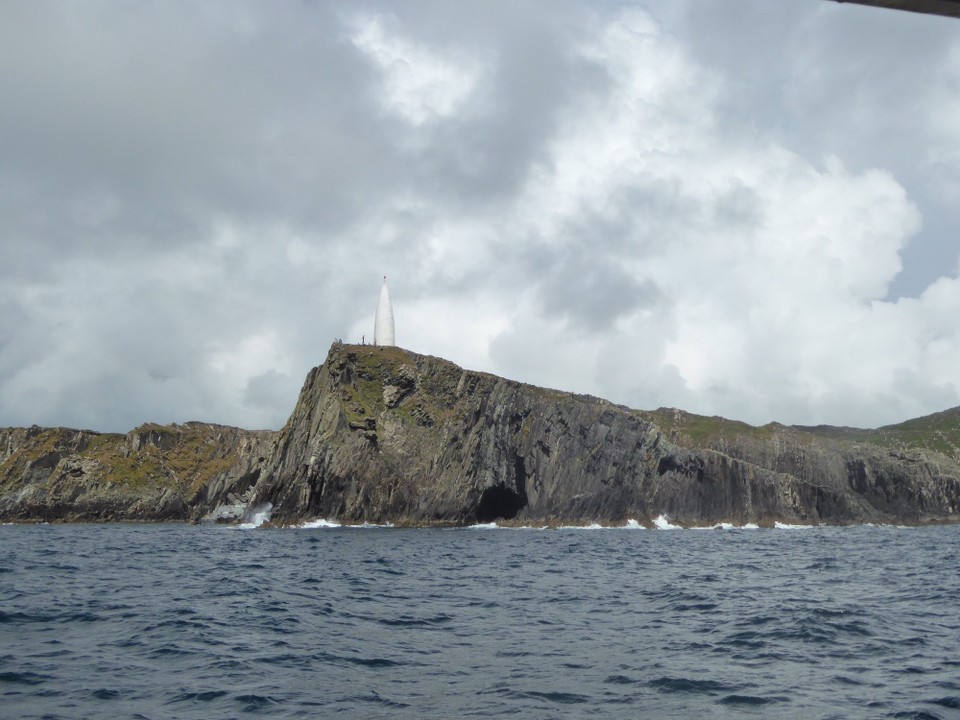 Ireland - Baltimore - The Baltimore Beacon, a white painted stone beacon, built in 1848.