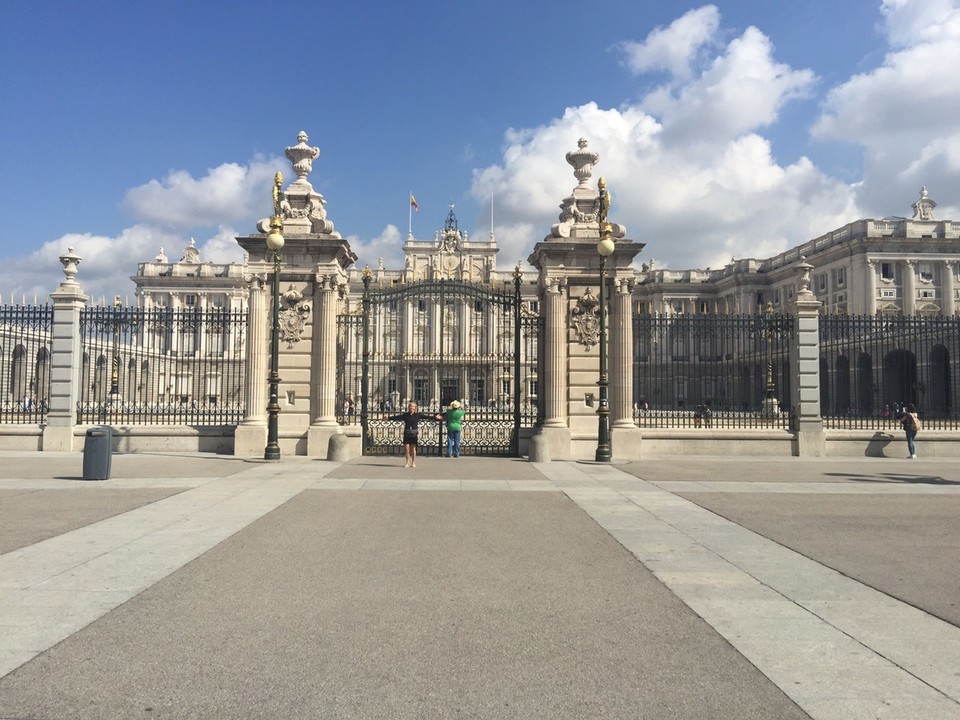 Spain - Madrid - Palacio Real. The Royal Palace of Madrid. The top centre piece. Above the clock is the royal coat of arms flanked by angels, and above, bells dating from 1637 and 1761. 