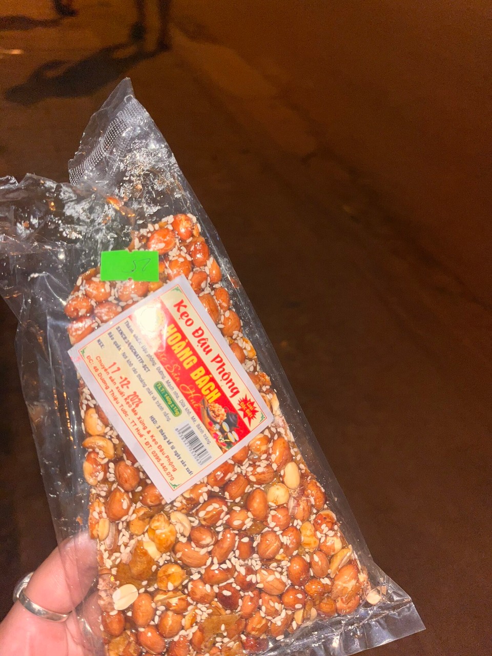Vietnam - Bo Trach - Went to the shop and got some snacks. This is the local snack, peanuts with chocolate and honey. It’s so nice. Had some of this before going to bed :) 