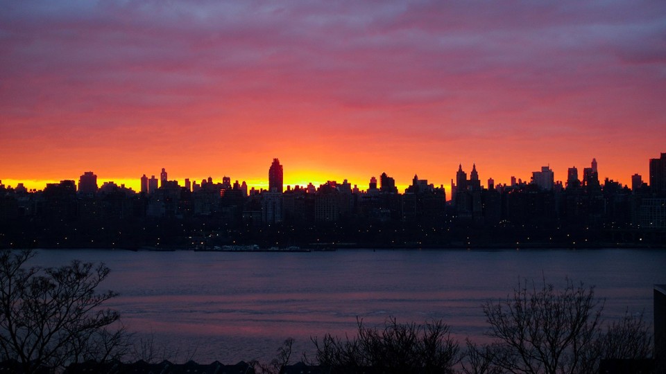 USA - New York City - Blick aus Aniˋs Haus auf Manhatten. Sonnenaufgang.