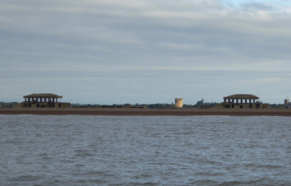 United Kingdom - Southwold - Old and new defence structures. The spit was also home to a distinctive red and white lighthouse completed in 1792, but decommissioned in 2013 and demolished in 2020 because of the encroaching sea.