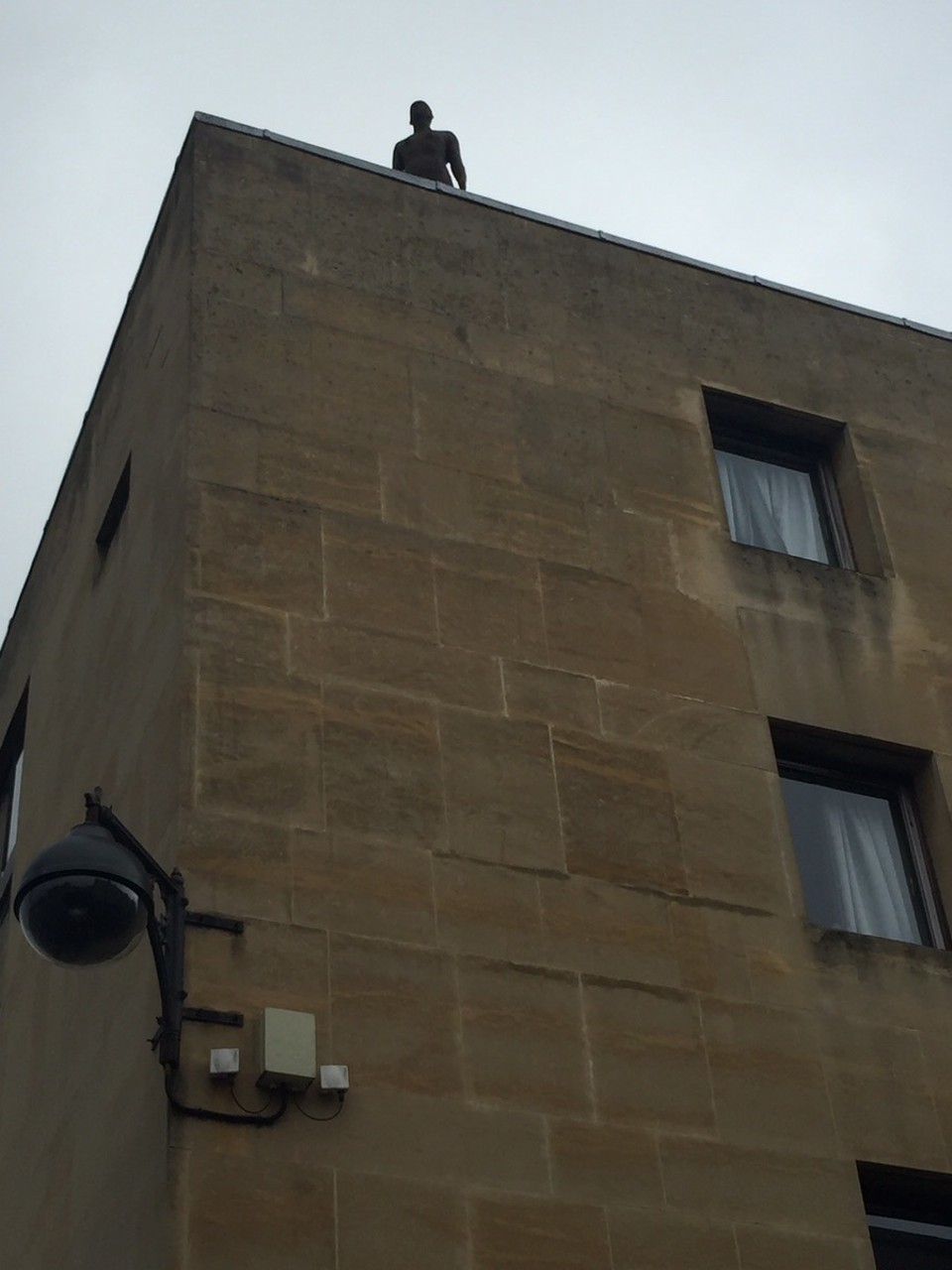  - United Kingdom, Oxford - A statue of a nude man by Antony Gormley (who sculpted the Angel of the North) was placed on the roof of Blackwell’s Art and Poster shop, on the corner of Broad and Turl Streets, at 9.30am on Sunday 15 February 2009.
The 7-foot-tall statue is made of iron and weighs half a tonne, and is part of Gormley’s “Another Time II” series of figures. An anonymous benefactor provided the funds for Exeter College to secure the sculpture.