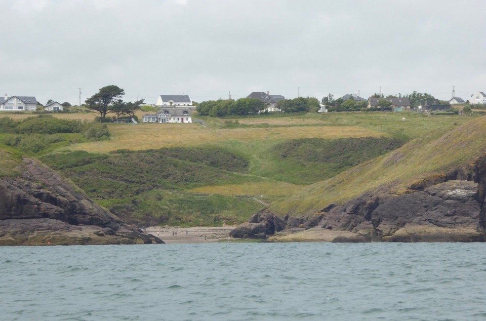 Ireland - Dunmore East - …and later passing it by sea.