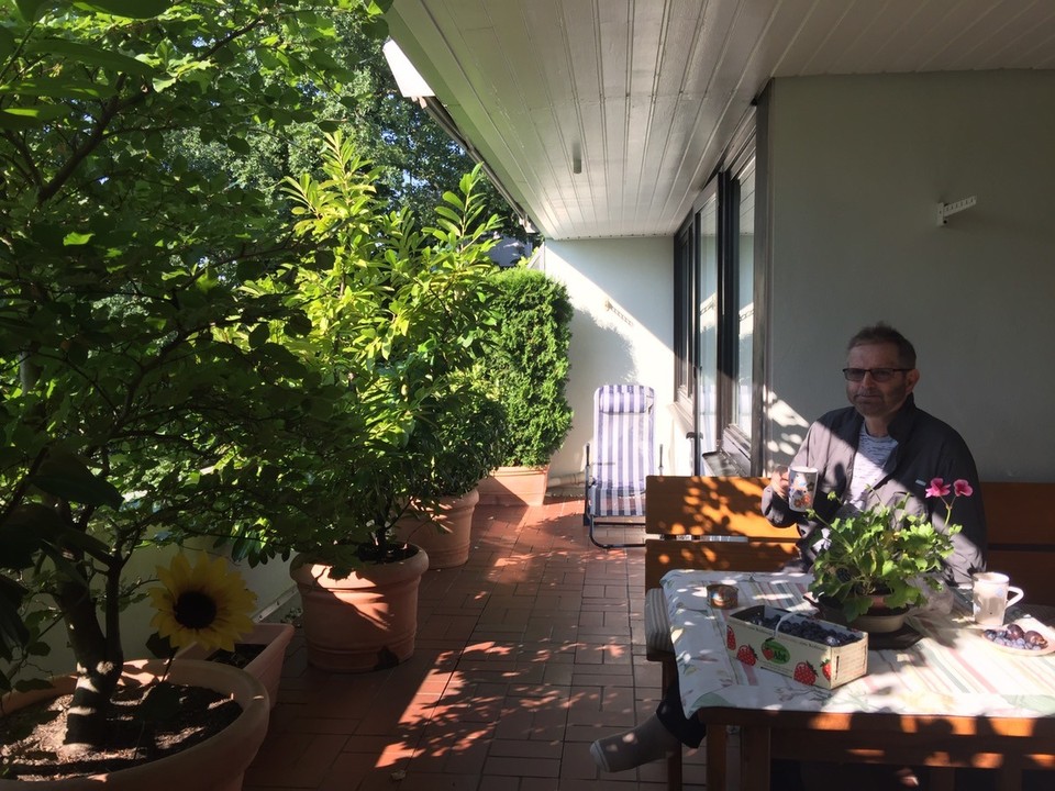  - Germany, Bremen - Breakfast on the balcony at Horst's apartment with freshly picked blueberries. Serenity. 