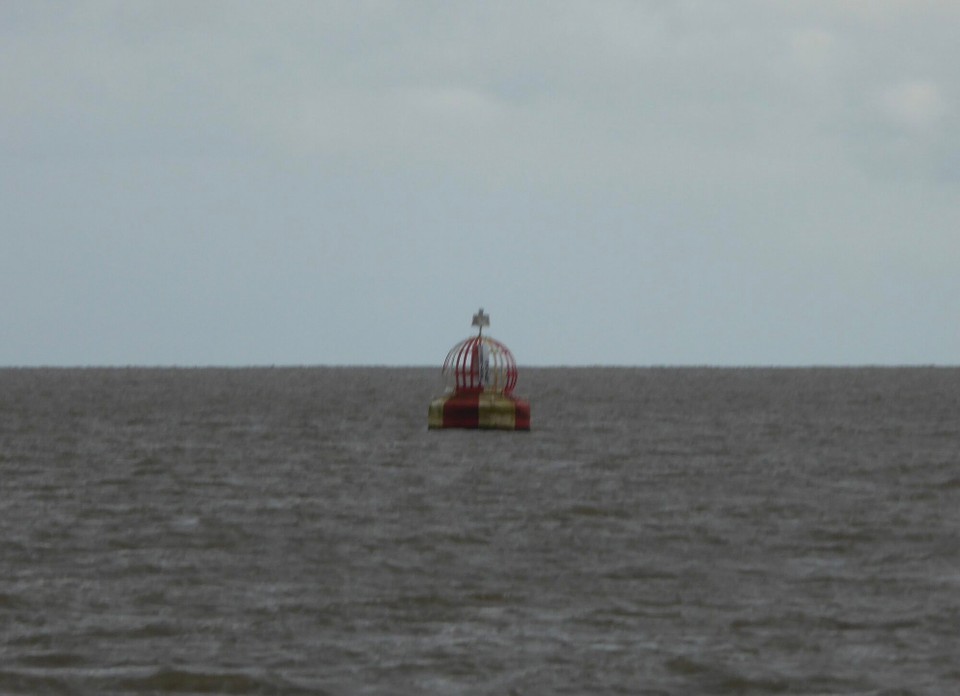 United Kingdom - Woodbridge - Safe Water buoy at the mouth of the Deben River.
